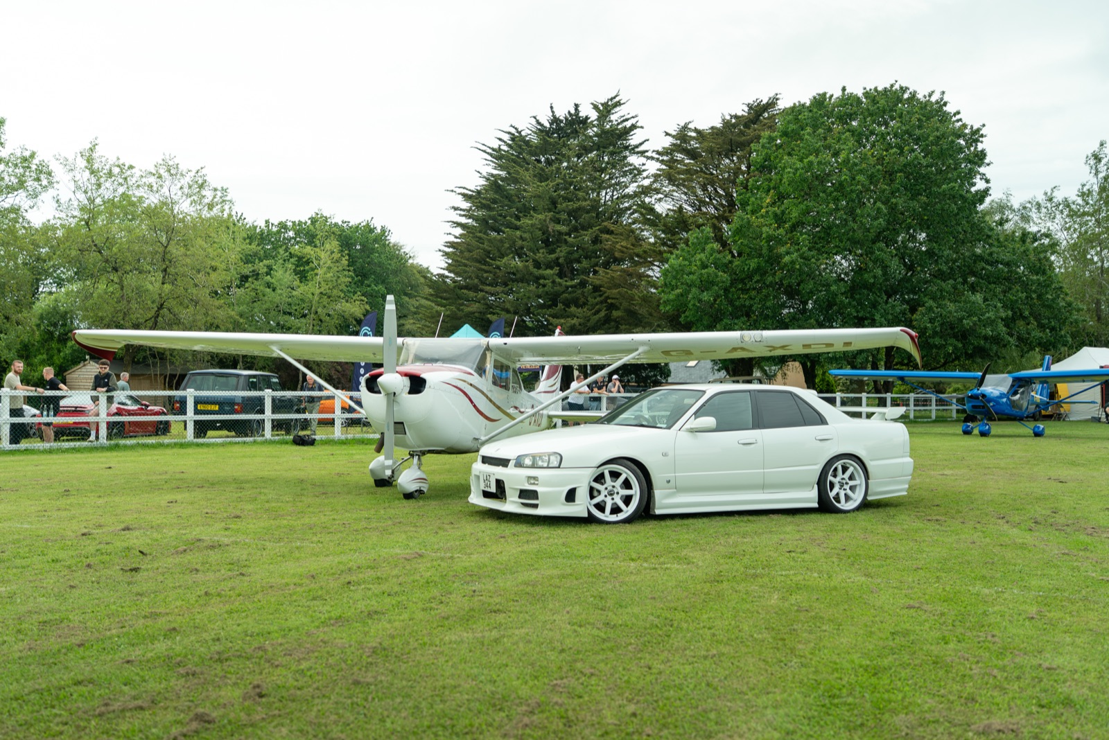 Wings x Wheels — aircraft and cars on the field